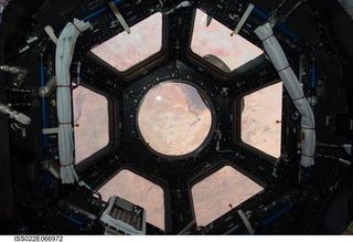 Illustration for article titled The Precarious Light-Filled Vista From The International Space Station